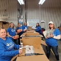 BLC Community Bank employees preparing donations