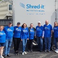 BLC Community Bank employees standing in front of Shred-it truck