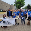 BLC Community Bank employees preparing for a parade