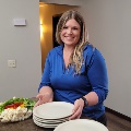 BLC Community Bank employee preparing food