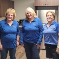 BLC Community Bank employees posing in kitchen